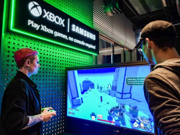 two people viewing Minecraft Legend on a Samsung monitor